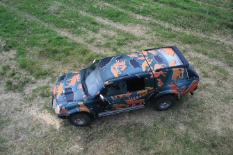 Fahrzeugschutz mit jagdlicher Tarnung