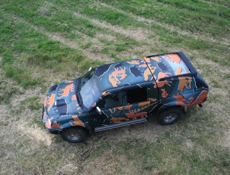 Fahrzeugschutz mit jagdlicher Tarnung