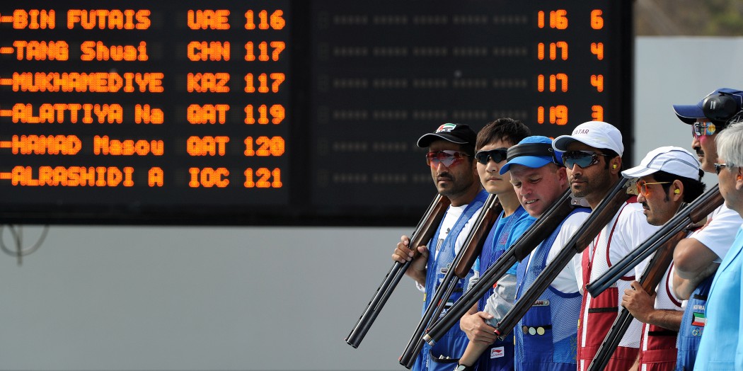 Competitors line up before the start of